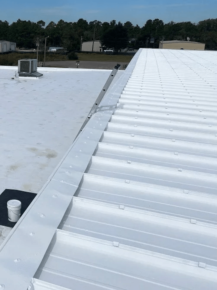 flat roofing services for slow slope roofs in Richmond VA area